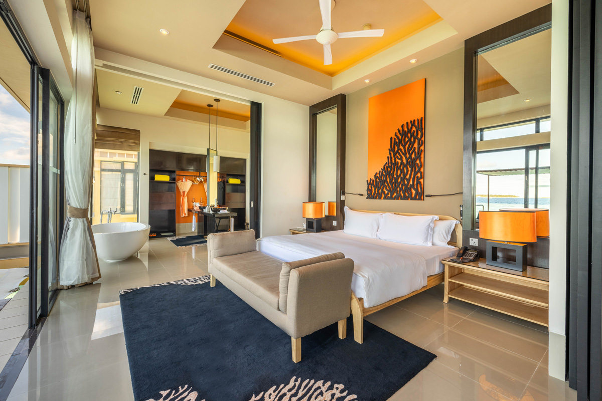 an-velavaru_accomodation-InOcean Pool Villa_Interior_Bedroom_2